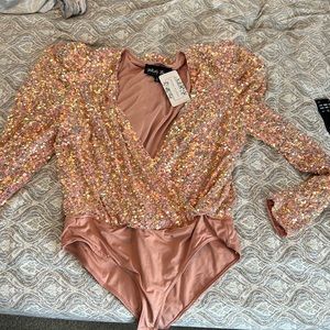 White birch sequin body suit.